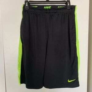 Men’s Nike black w/ neon yellow shorts - Size M